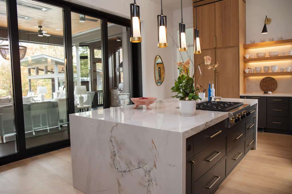 Vein matched kitchen island with waterfall by ROCKin'teriors | Fabricator Spotlight